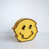 Trippy Smiley Face Candle Yellow