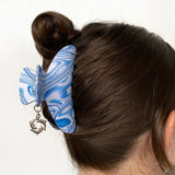 Chunks- Charmed Baby Dolly Claw in Blue Crush