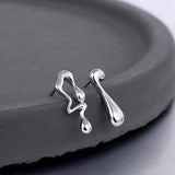 Silver Asymetric Drippy Earring
