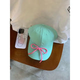 Green Baseball Cap With Pink Bow